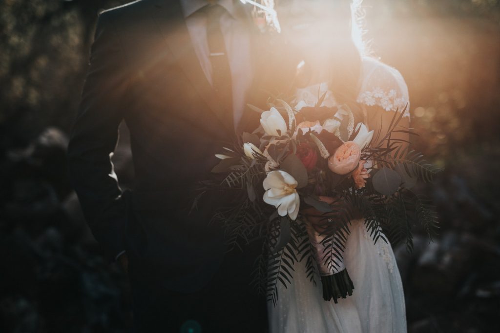 Photo of a married couple by Nathan Dumlao on Unsplash